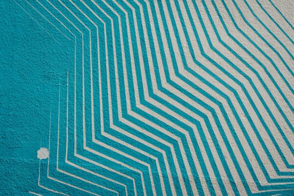 Deed of Hypothecation as a Guarantee under IBC a blue and white wall with a pattern on it