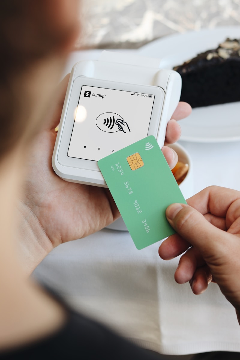 Recalibrating Innovation: The Fintech Regulatory Renaissance in India (2025) 1 A person holding a credit card in their hand
